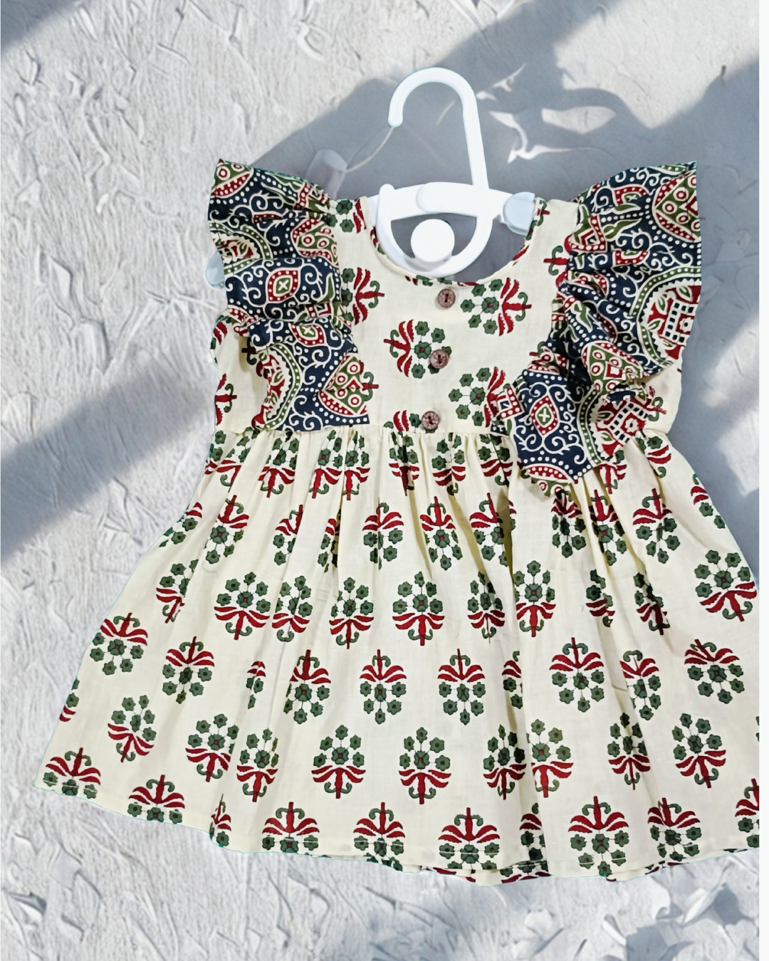 Sigoor Fashion Cotton Baby Girl Frock Cream Ajrakh Print Frill Sleeve Dress – Traditional Stylish Daily Wear (6–12 Months)