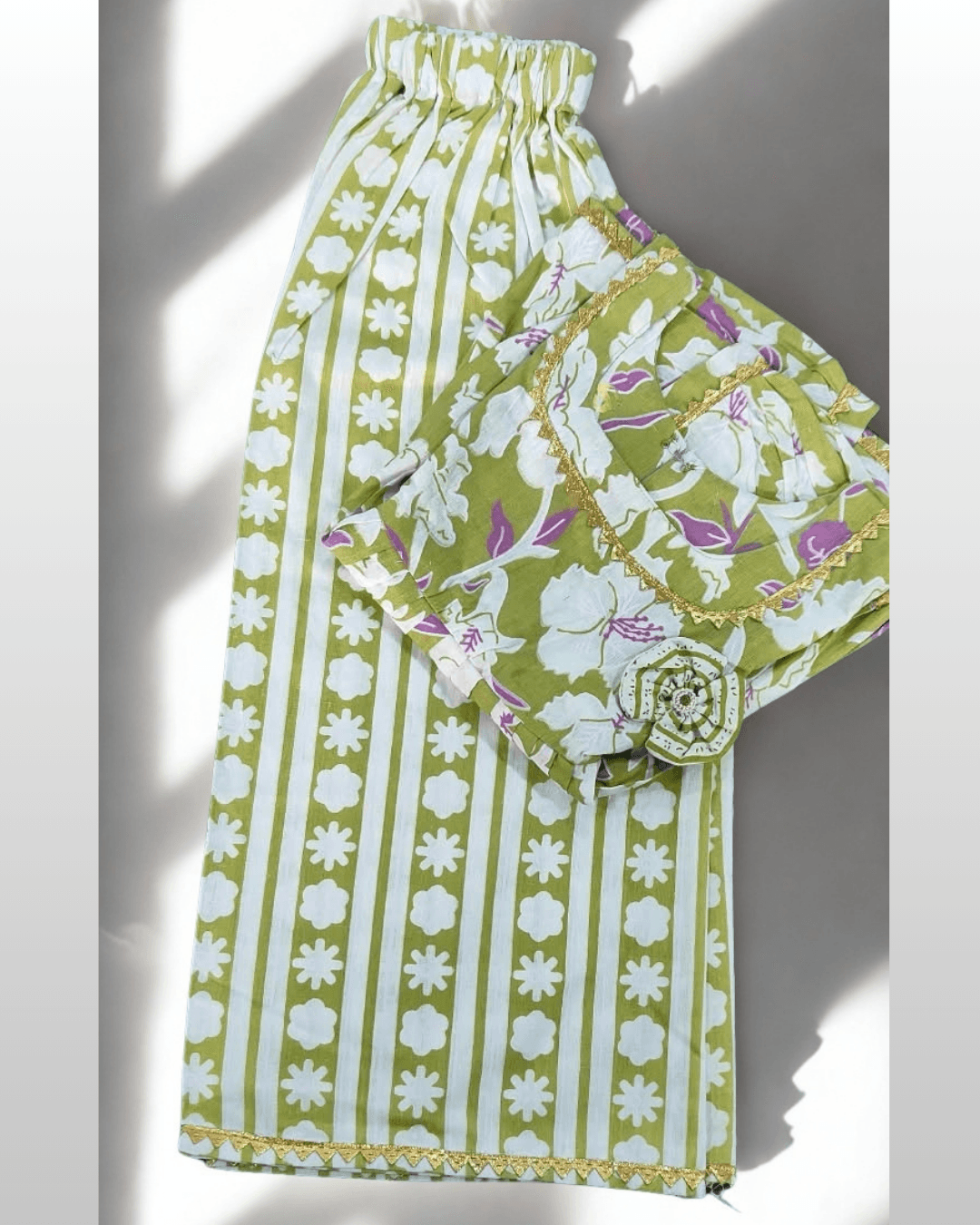 Bahaar baby girl kurti set, olive green base, large white/purple floral print, gold gota trim - folded