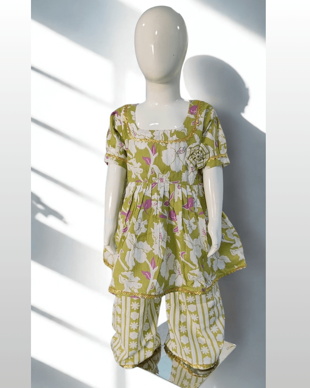 Bahaar baby girl kurti set, olive green base, large white/purple floral print, gold gota trim - front view