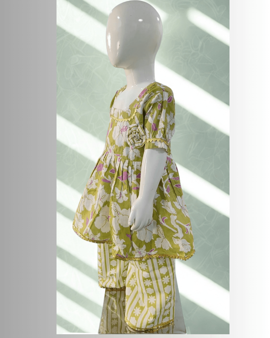 Bahaar baby girl kurti set, olive green base, large white/purple floral print, gold gota trim - side view