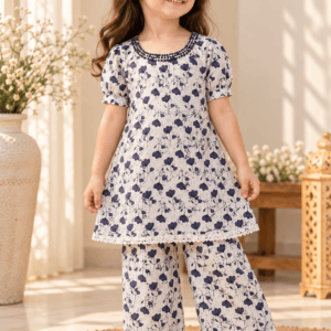 Chandni baby girl kurti set, white base, blue floral print, beaded neckline - worn by a baby girl model
