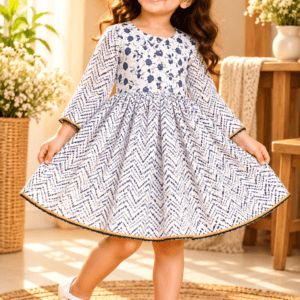Baby girl wearing Kajal white and black chevron cotton frock with floral yoke
