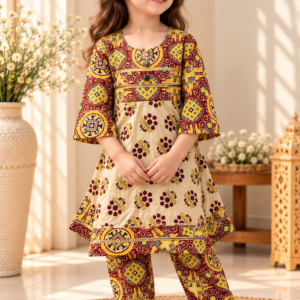 Kesari baby girl kurti set, cream base, red/yellow bold ajrakh geometric print, gold gota trim - worn by a baby girl model