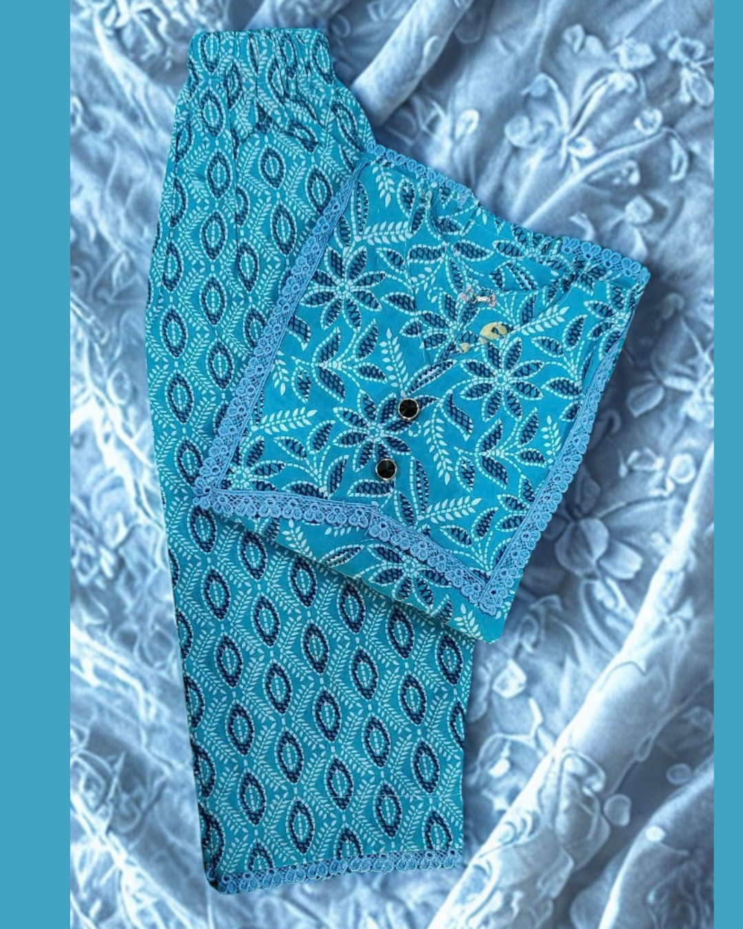 Neelam baby girl kurti set, blue base, dark blue leaf/floral print, blue lace, oval-print palazzo - folded