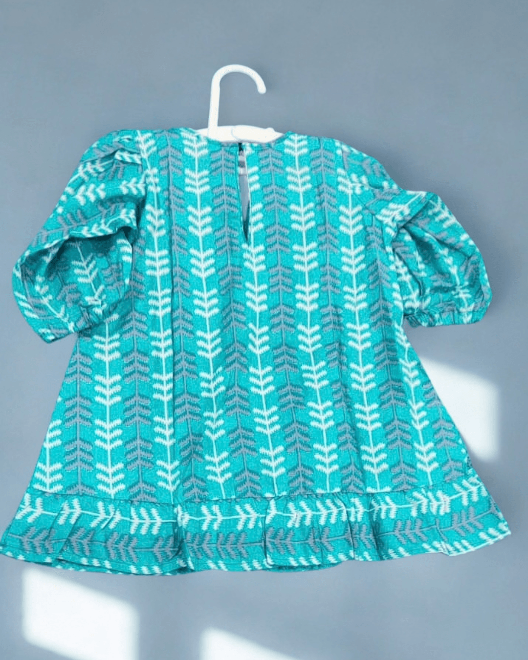 Nilofar teal chevron and leaf print cotton frock for baby girl - back view