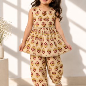 Parizaad baby girl kurti set, cream base, red-yellow floral block print, sleeveless, gathered waist, 3 buttons, gold braid, matching pants - worn by a baby girl model