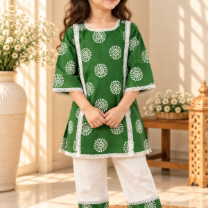Sabza baby girl kurti set, deep green base, white mandala circle print, white lace, white palazzo - worn by a baby girl model