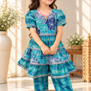 Samandar baby girl kurti set, sea-green and blue leaf and fern print, puff sleeves, tiered frill skirt, silver lace - worn by a baby girl model