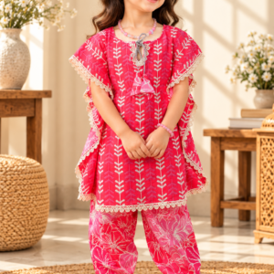 Sawera baby girl kurti set, bright pink kaftan style, white fern print, silver cord tie neckline, cream lace edges, floral-print pants - worn by a baby girl model