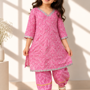 Yasmeen baby girl kurti set, soft pink base, white leaf-floral print, silver gota lace on V-neckline, sleeves and hem, oval-print pants - worn by a baby girl model